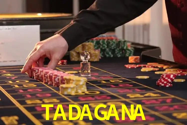 Una escena digital vívida inspirada en casino con TADAGANA mostrado prominentemente, luces brillantes, fichas, cartas y acentos dorados.